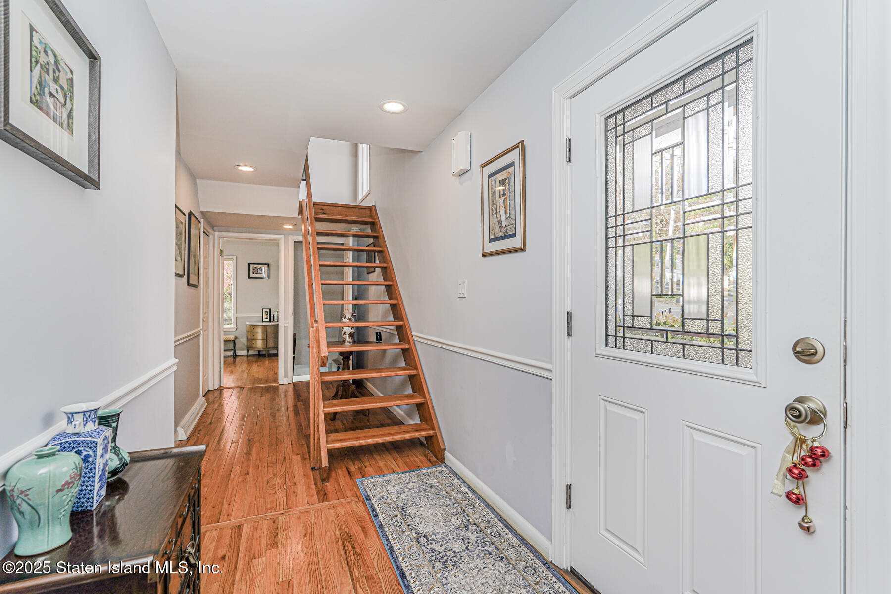 20 Signal Hill Road Staten Island, NY 10301 - Photo 4 of 42 workspace with wooden floor and stairs