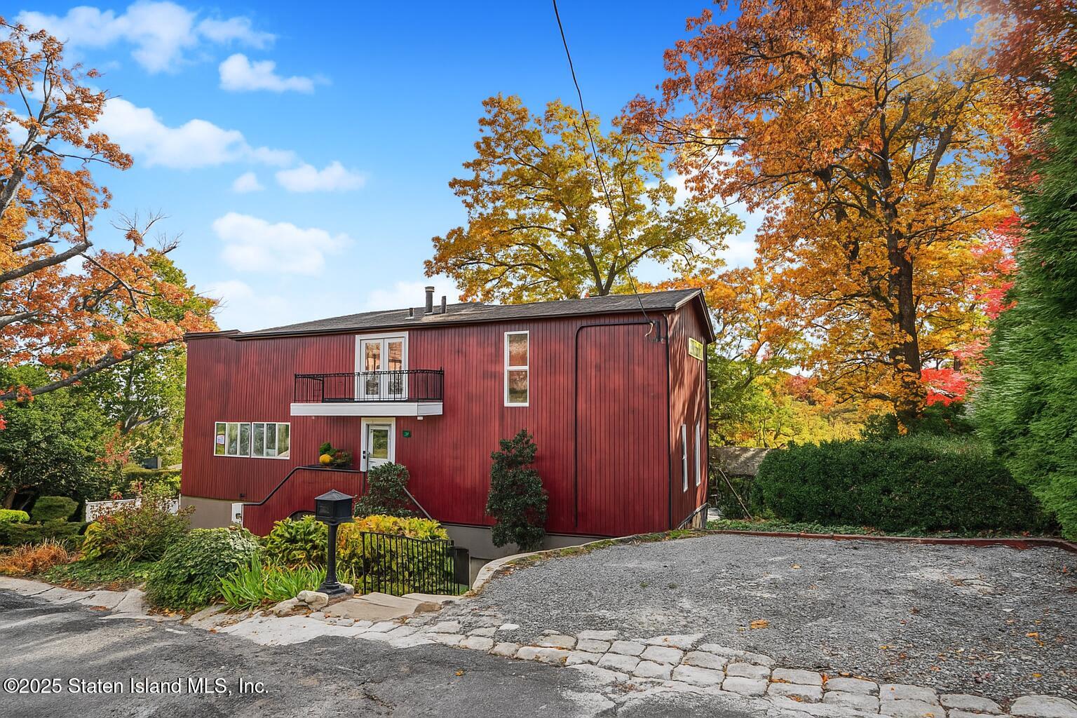 20 Signal Hill Road Staten Island, NY 10301 - Photo 41 of 42 a front view of a house with a yard