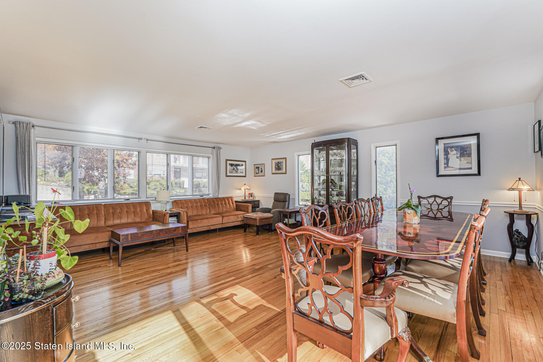 20 Signal Hill Road Staten Island, NY 10301 - Photo 7 of 42 a living room with furniture and a large window