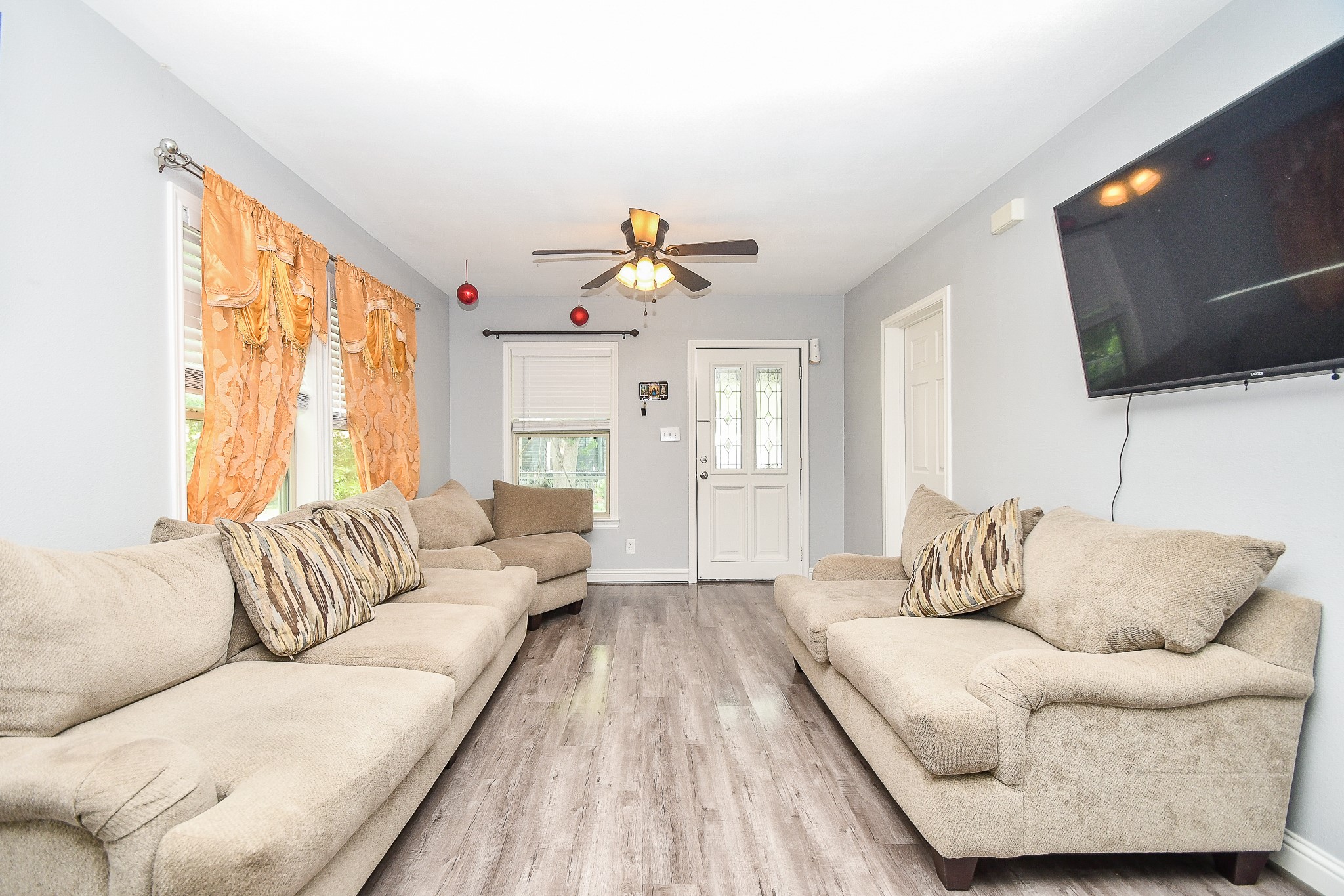 1607 Sylvester Road Houston, TX 77009 - Photo 13 of 32 a living room with furniture and a large window