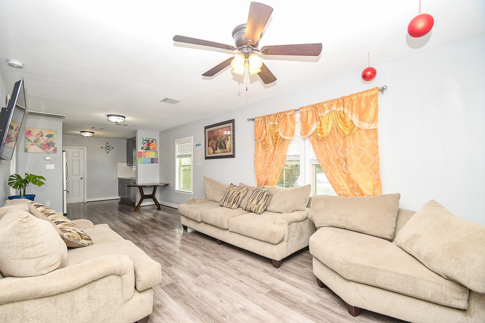 1607 Sylvester Road Houston, TX 77009 - Photo 7 of 32 a living room with furniture and a large window