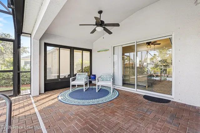 a view of a livingroom with table and front door