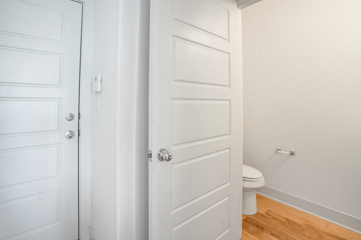 5910 Rubicon Run Austin, TX 78745 - Photo 14 of 18 Bathroom with baseboards and light wood finished floors