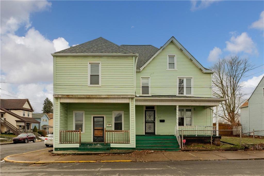 254-256 Pennsylvania Avenue Rochester, PA 15074 - Photo 1 of 32 a front view of a house