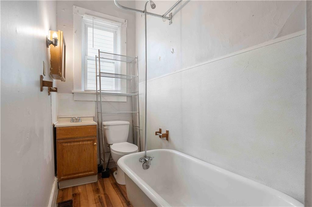 254-256 Pennsylvania Avenue Rochester, PA 15074 - Photo 27 of 32 a bathroom with a tub and shower