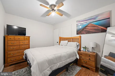 a bedroom with a bed and furniture