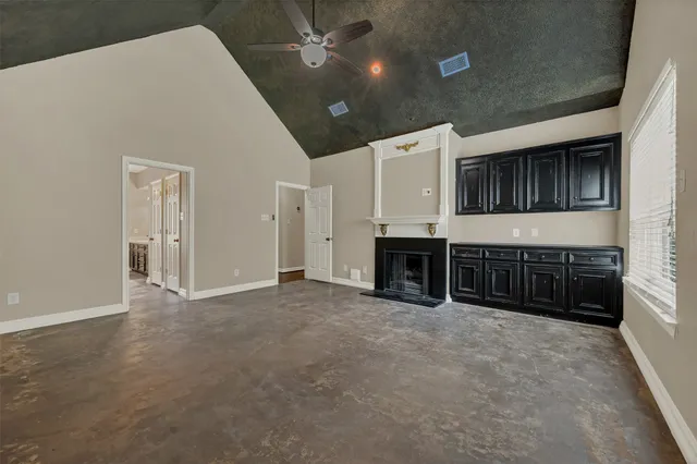 a view of kitchen with furniture and fireplace