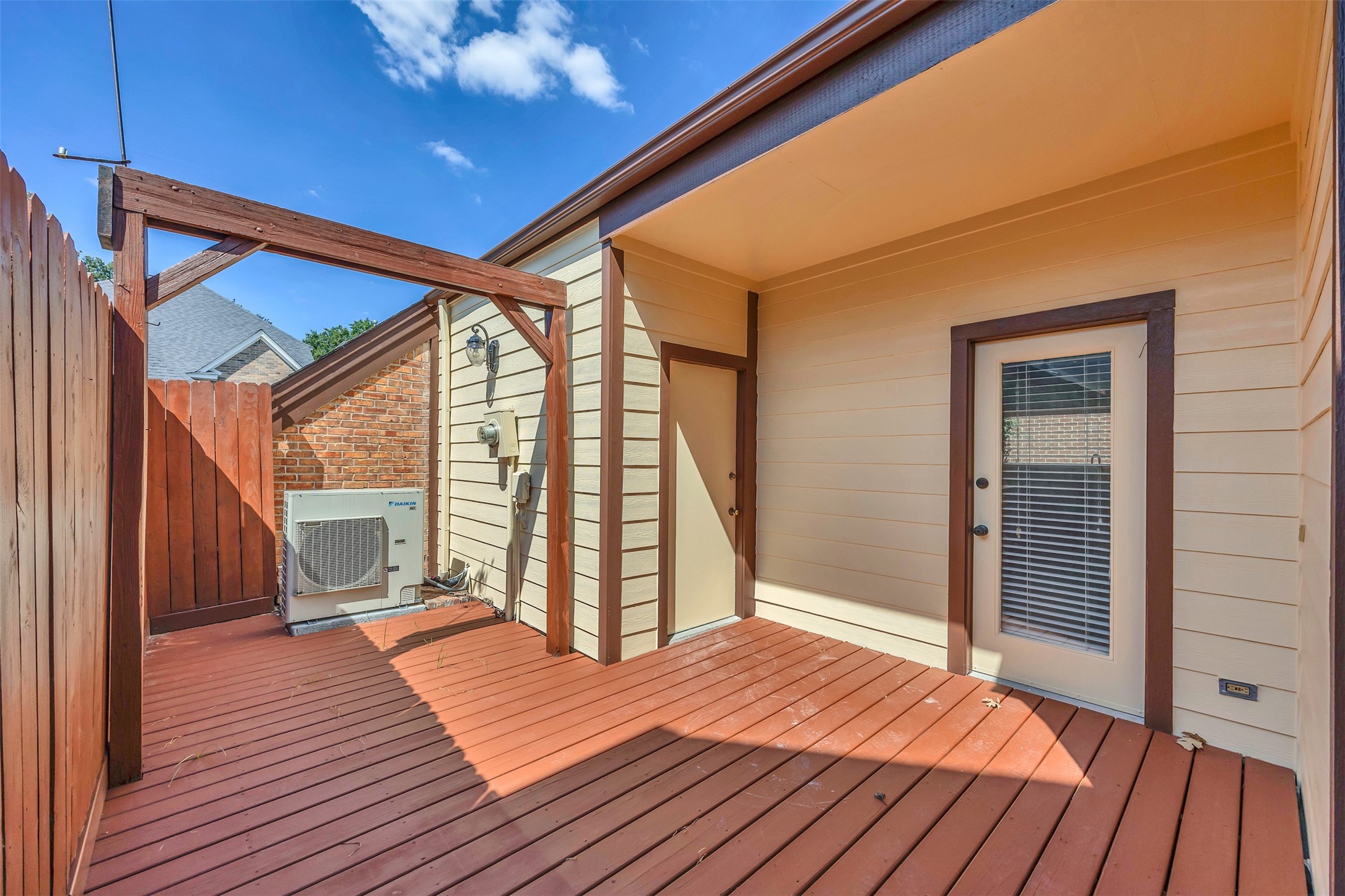 7659 Ameswood Road Houston, TX 77095 - Photo 23 of 24 a bedroom with a bed and wooden floor