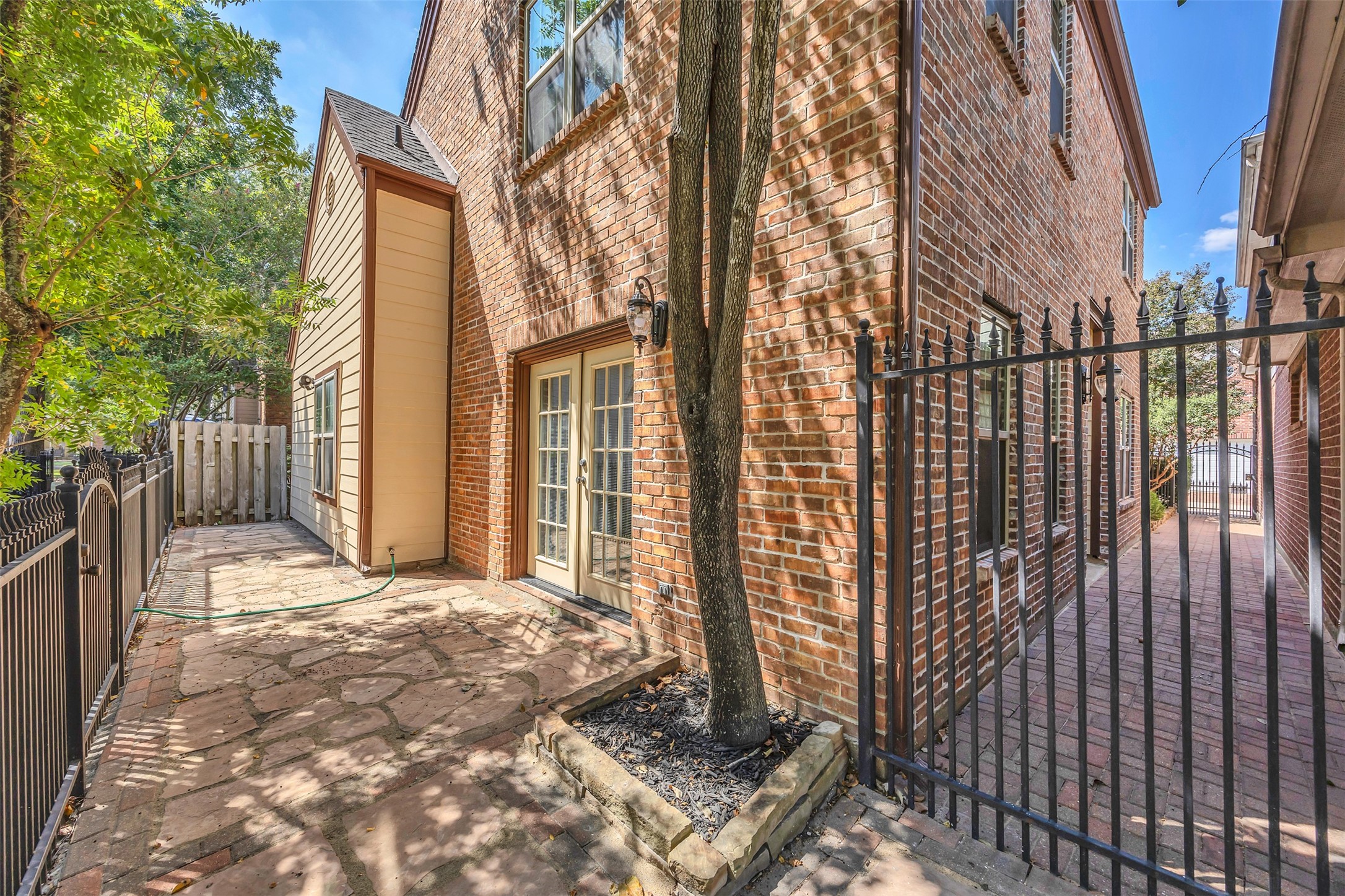 7659 Ameswood Road Houston, TX 77095 - Photo 24 of 24 a view of a house with brick walls