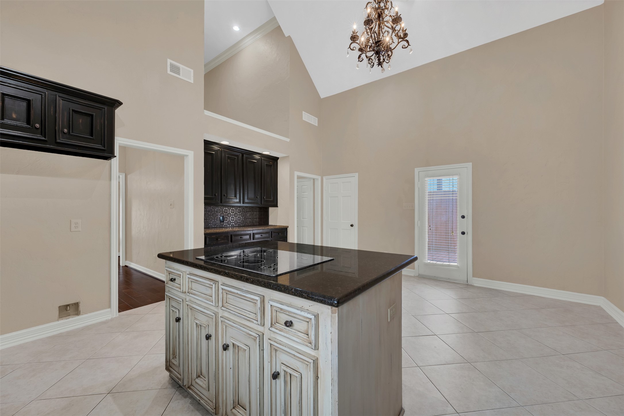 7659 Ameswood Road Houston, TX 77095 - Photo 7 of 24 a kitchen with stainless steel appliances granite countertop a sink stove and cabinets
