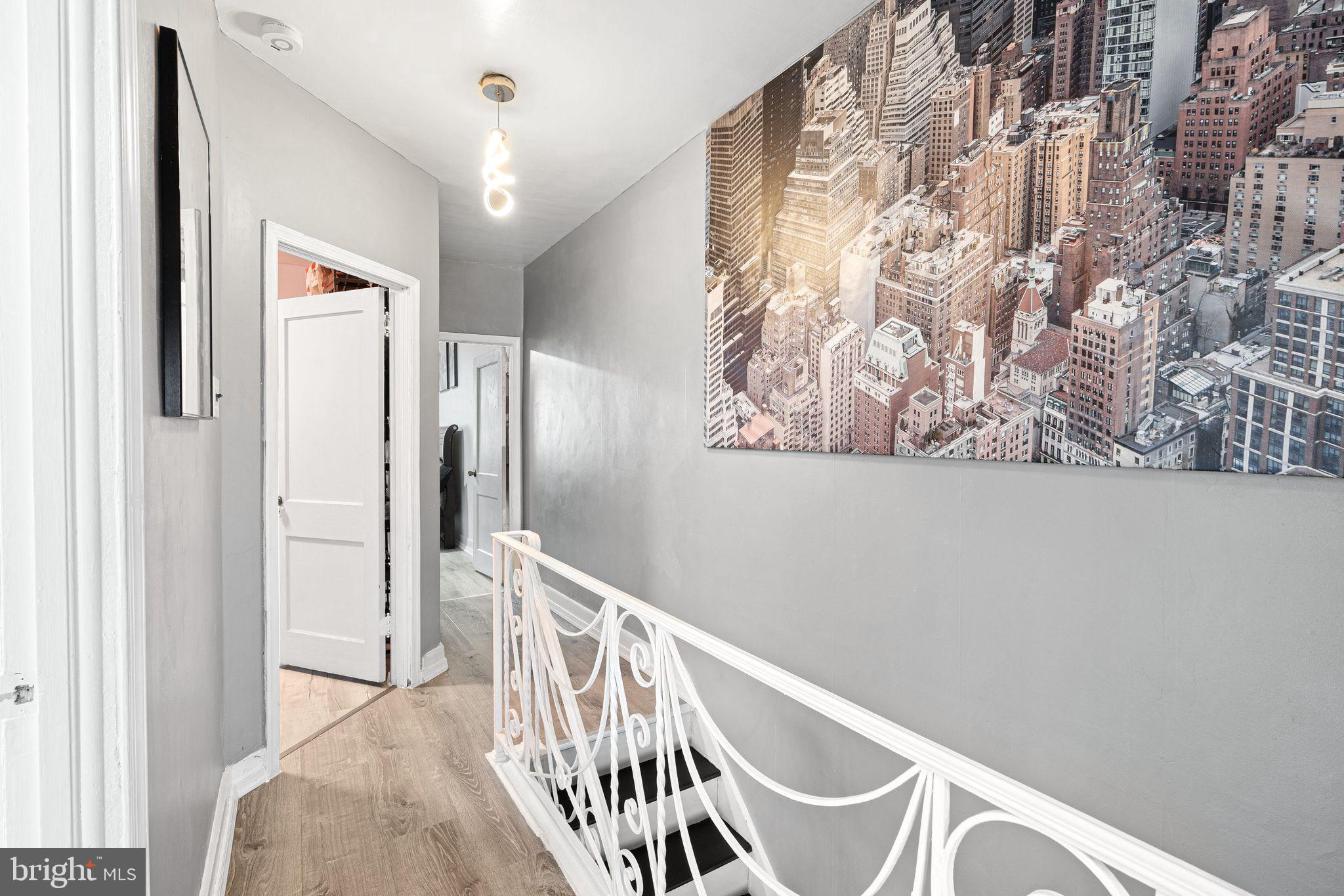 5431 Akron Street Philadelphia, PA 19124 - Photo 13 of 32 a view of a hallway with staircase