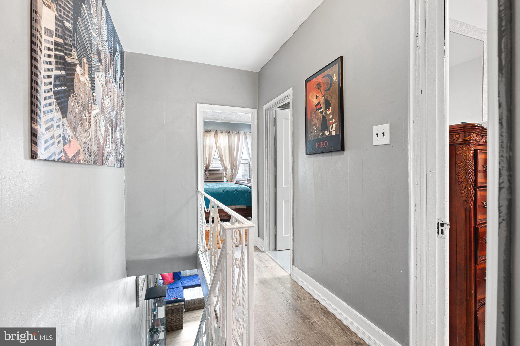 5431 Akron Street Philadelphia, PA 19124 - Photo 14 of 32 a view of front door with wooden floor