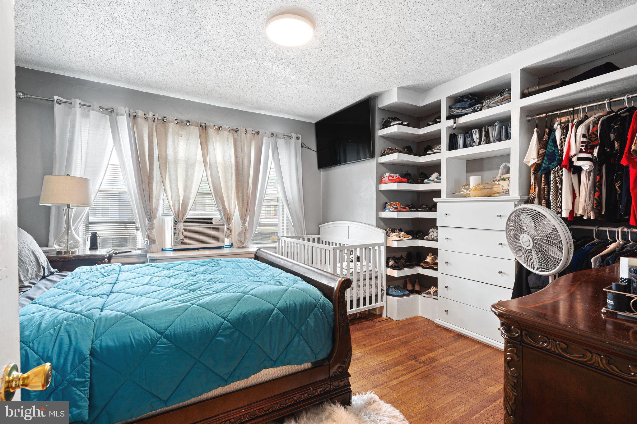 5431 Akron Street Philadelphia, PA 19124 - Photo 16 of 32 a bedroom with a bed and closet