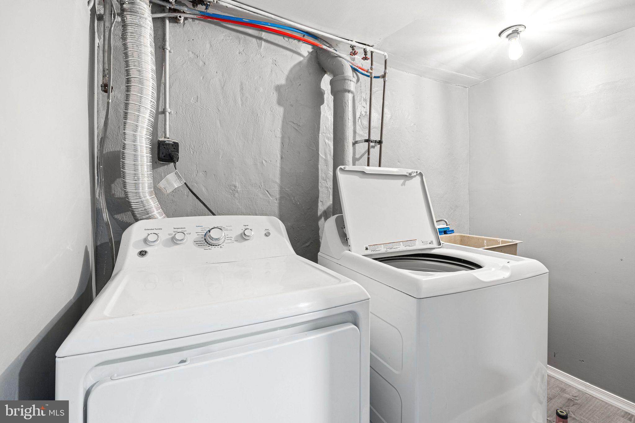 5431 Akron Street Philadelphia, PA 19124 - Photo 28 of 32 a utility room with dryer and washer