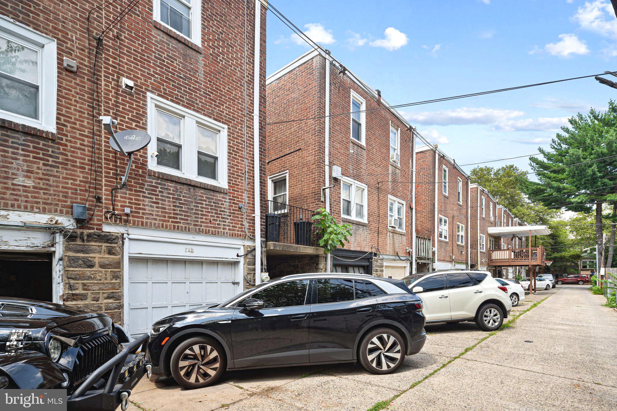 5431 Akron Street Philadelphia, PA 19124 - Photo 30 of 32 a view of a car parked in front of a building