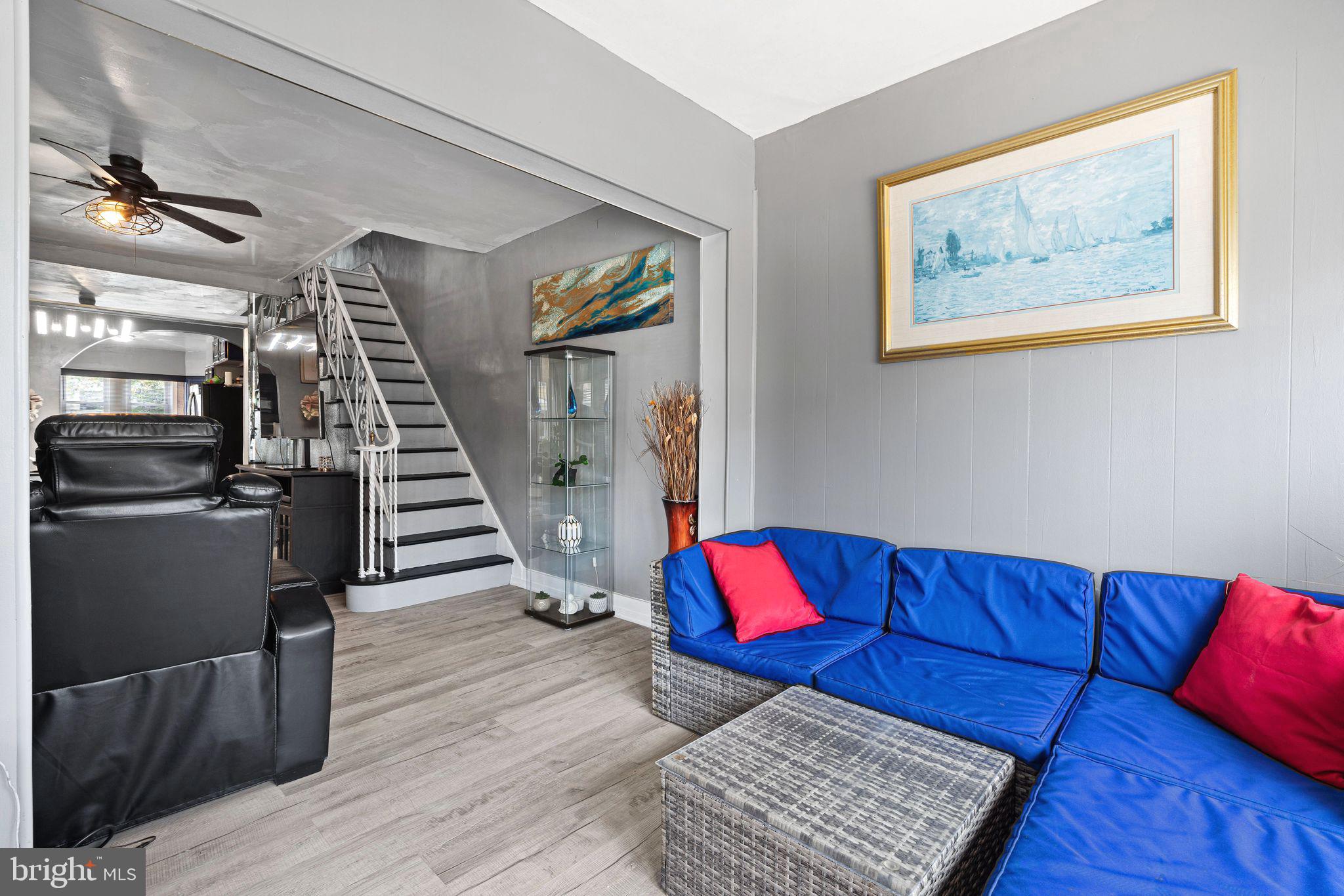 5431 Akron Street Philadelphia, PA 19124 - Photo 4 of 32 a living room with furniture and a fireplace