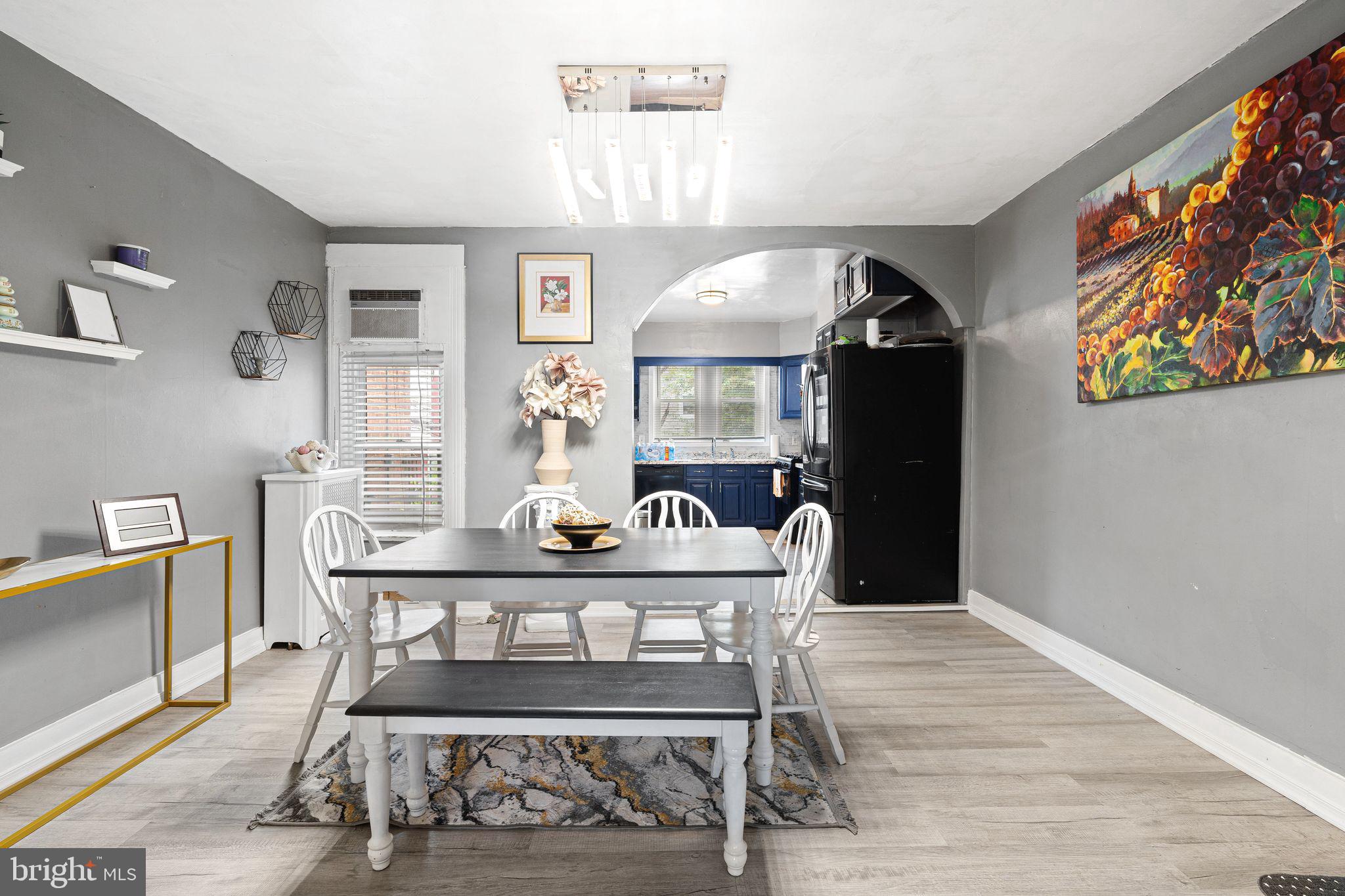 5431 Akron Street Philadelphia, PA 19124 - Photo 8 of 32 a view of a dining room with furniture and wooden floor