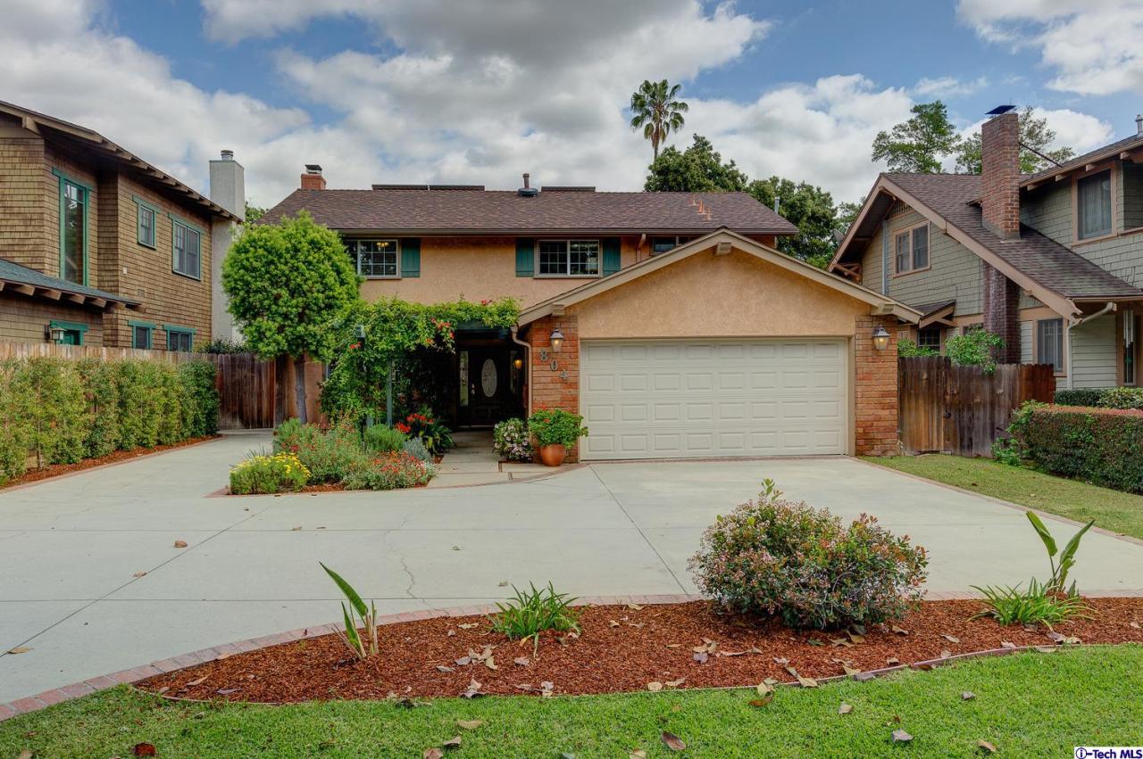 804 Milan Avenue South Pasadena, CA 91030 - Photo 2 of 58 a front view of a house with a yard and garage
