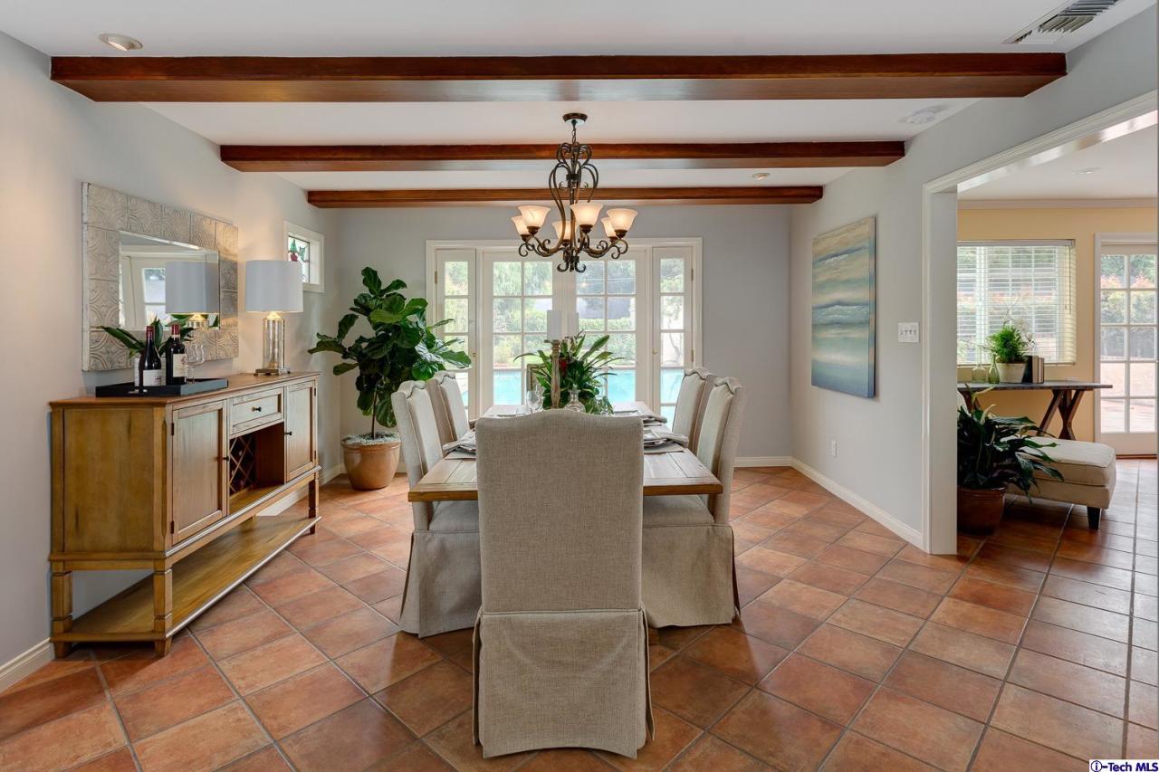 804 Milan Avenue South Pasadena, CA 91030 - Photo 12 of 58 a living room with furniture a chandelier and a fireplace