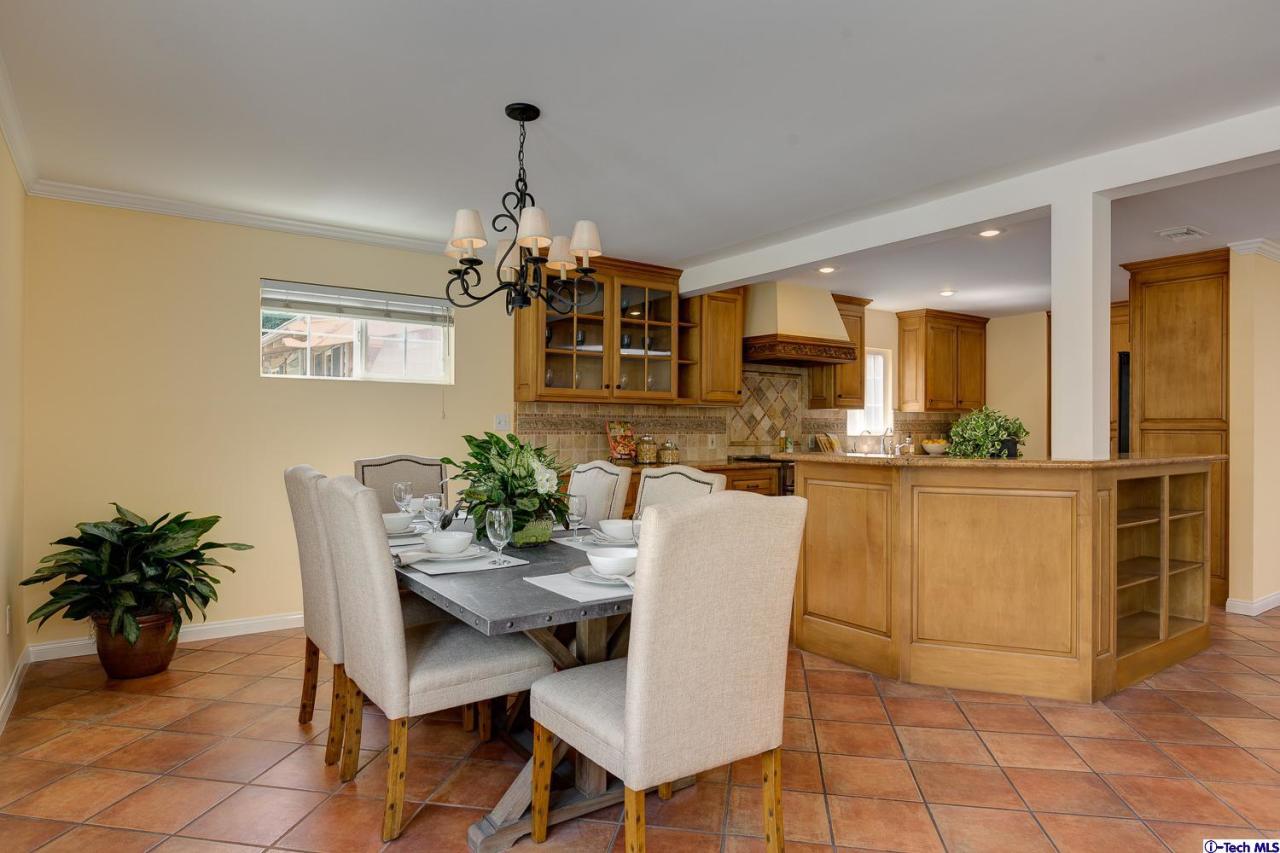 804 Milan Avenue South Pasadena, CA 91030 - Photo 18 of 58 a view of a dining room with furniture and a chandelier