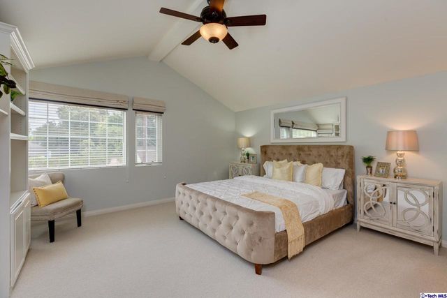 a bath tub sitting next to a bathroom sink