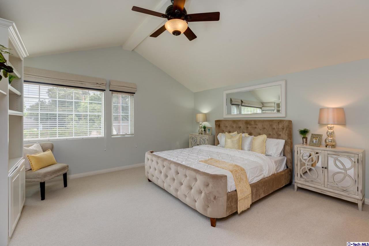 804 Milan Avenue South Pasadena, CA 91030 - Photo 29 of 58 a bedroom with a bed a couch and a window