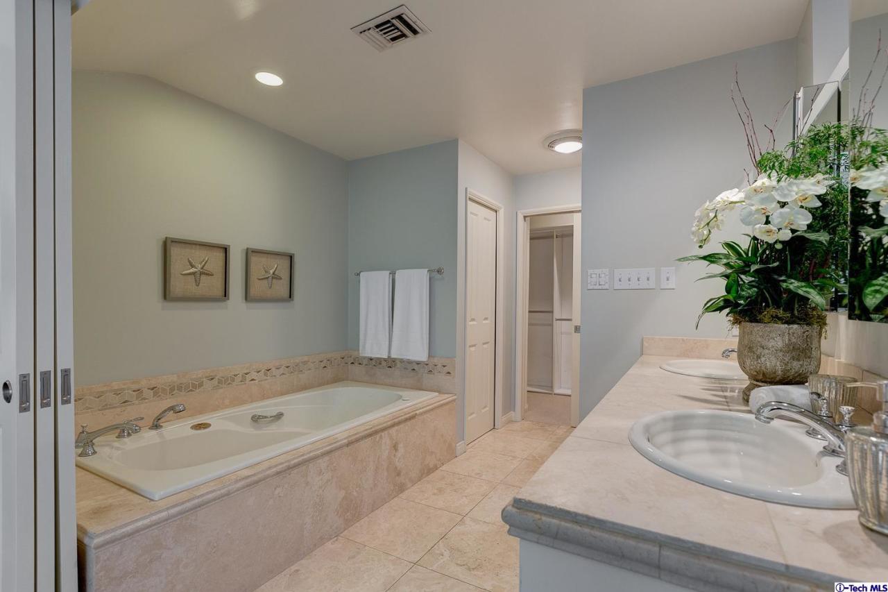 804 Milan Avenue South Pasadena, CA 91030 - Photo 32 of 58 a bath tub sitting next to a bathroom sink