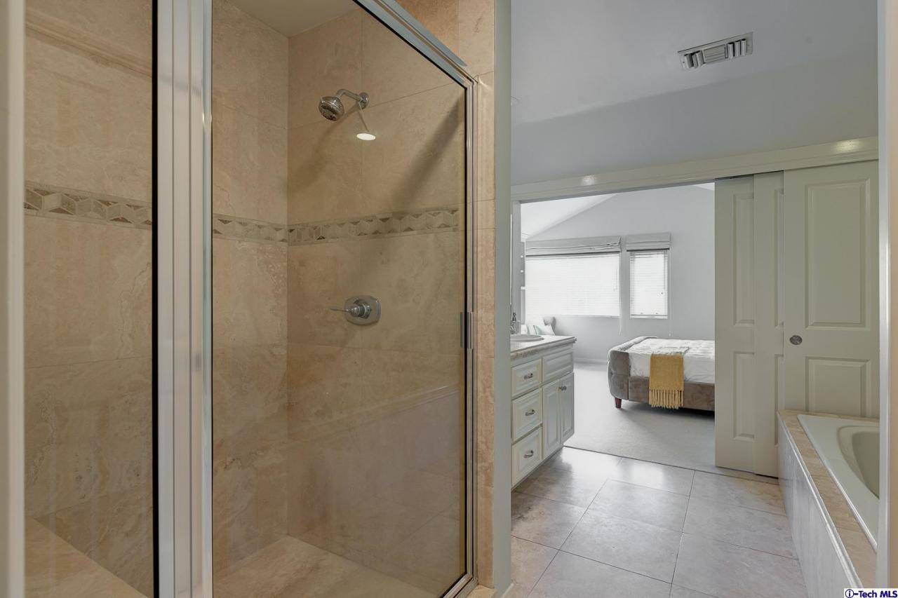 804 Milan Avenue South Pasadena, CA 91030 - Photo 34 of 58 a bathroom with a tub shower and sink