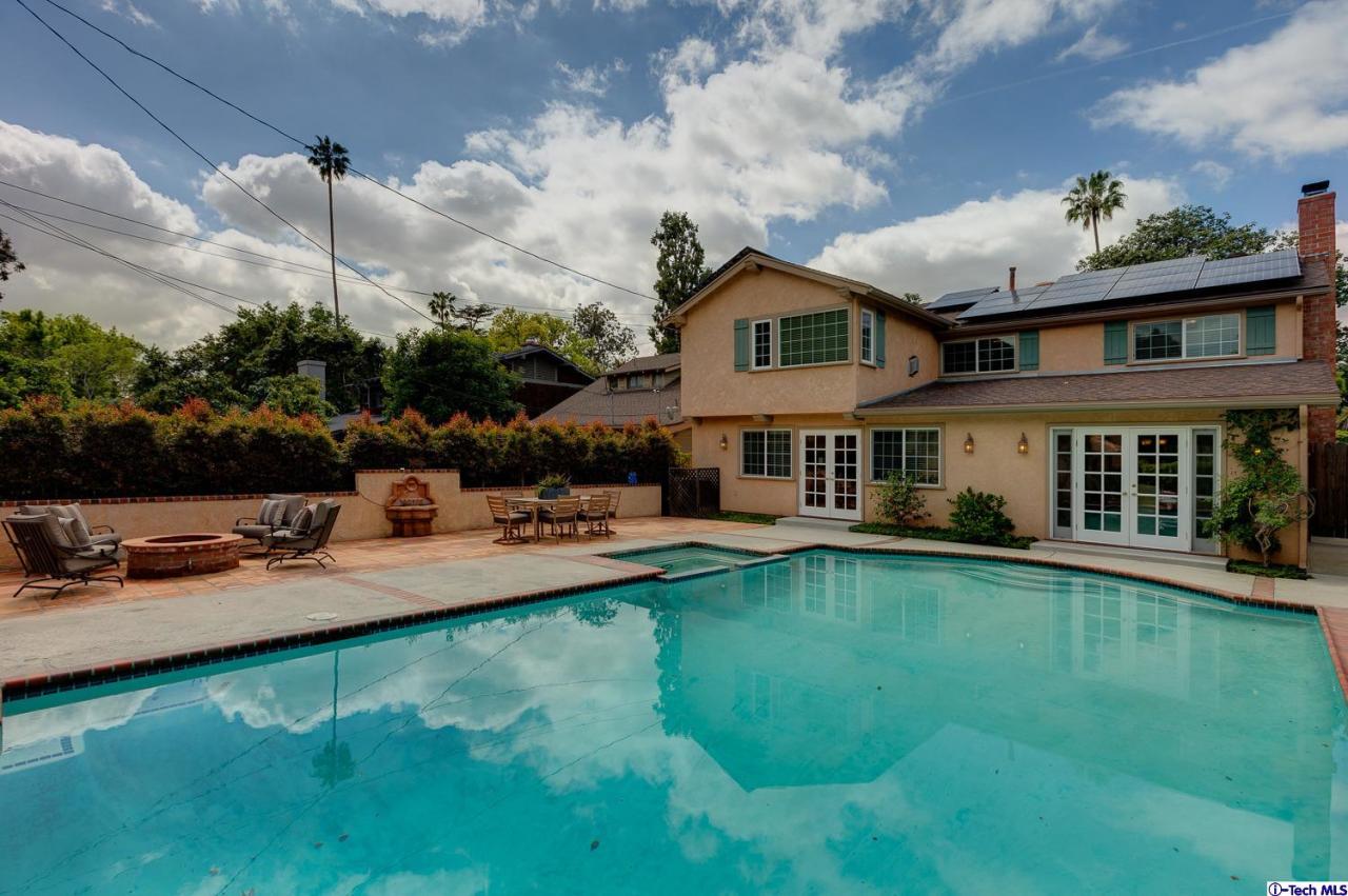 804 Milan Avenue South Pasadena, CA 91030 - Photo 40 of 58 a front view of a house with swimming pool garden and patio