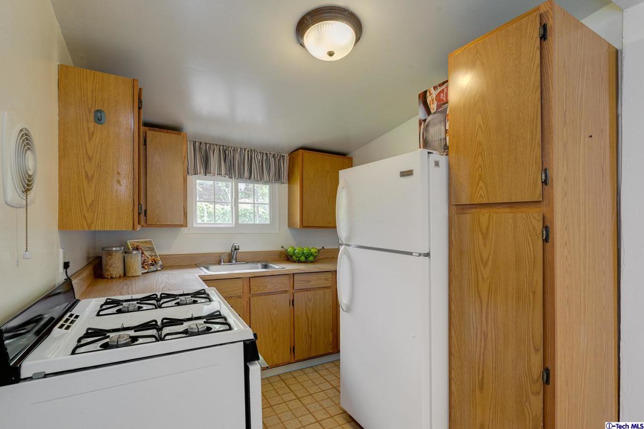 804 Milan Avenue South Pasadena, CA 91030 - Photo 50 of 58 a white refrigerator freezer sitting in a kitchen
