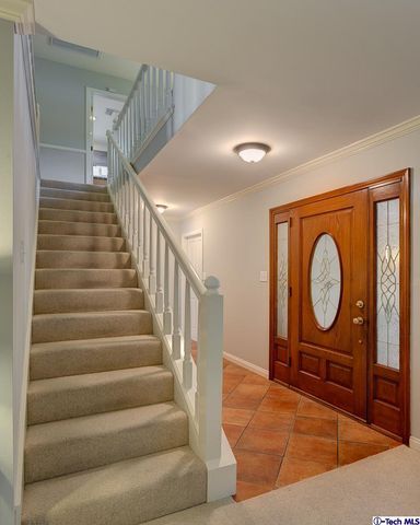 a view of an entryway with a front door