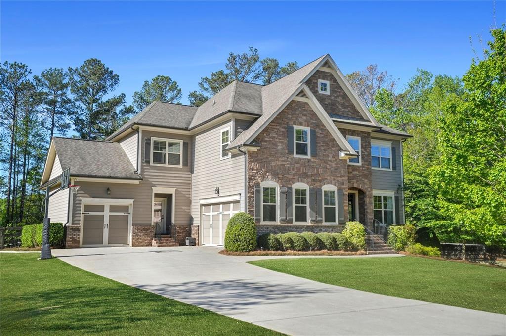 front view of a house with a yard