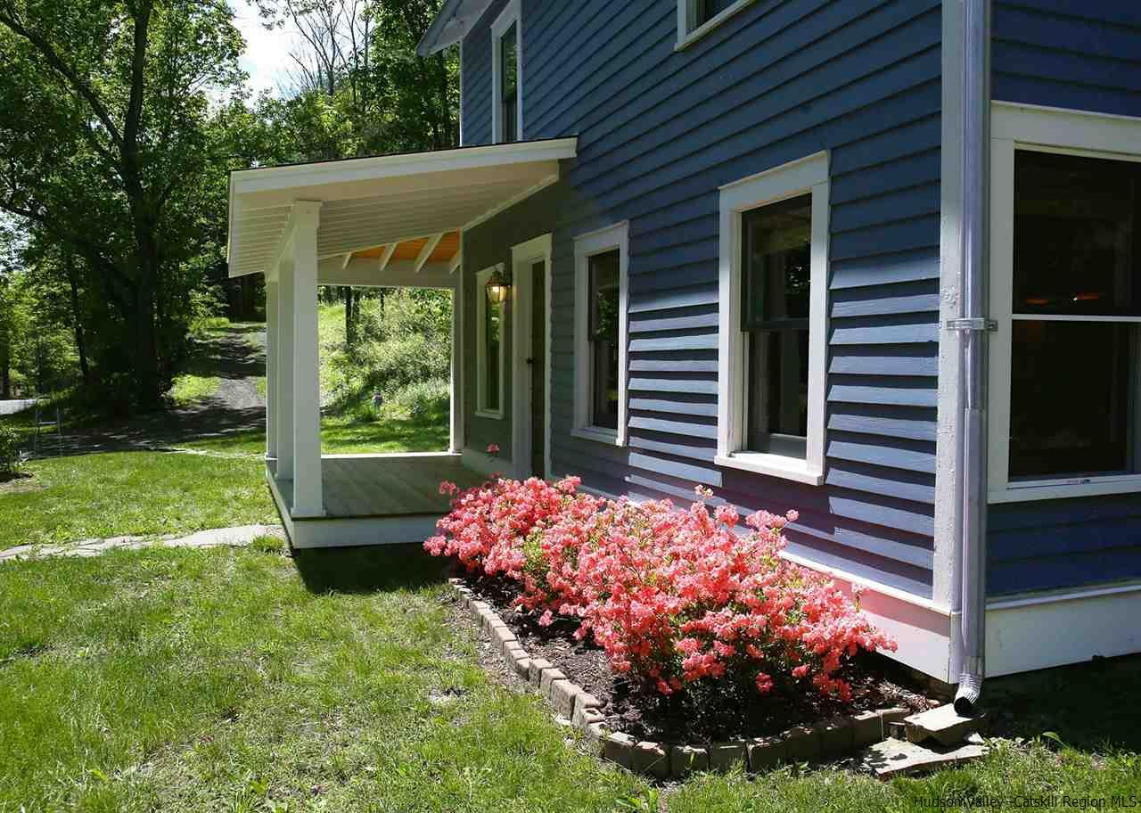 50 Rochester Center Road Accord, NY 12404 - Photo 19 of 30 a front view of a house with garden