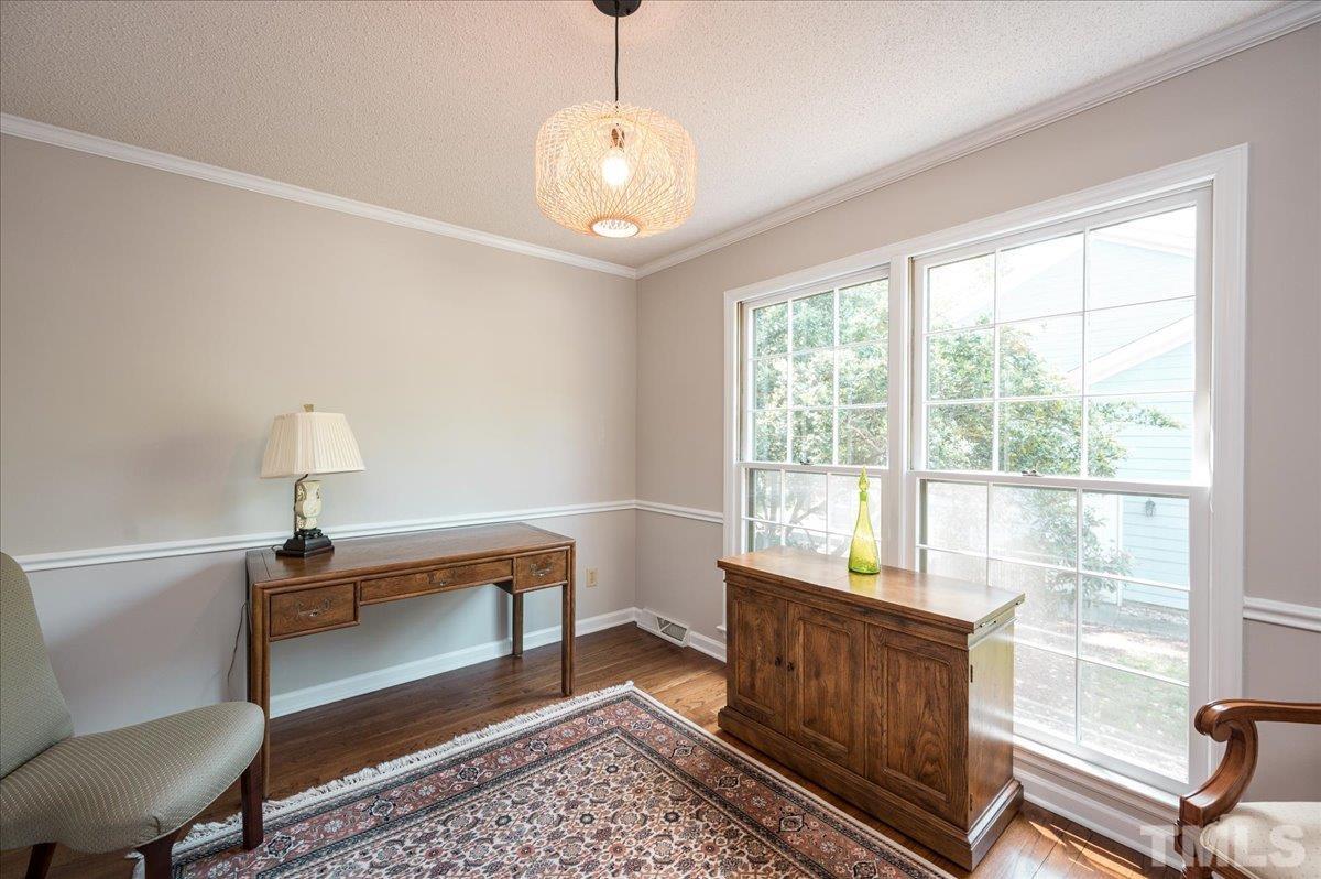 2012 Eagleton Circle Raleigh, NC 27609 - Photo 10 of 29 a bedroom with furniture and a window