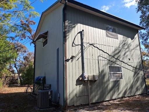 9723 Tom Street Hudson, FL 34669 - Photo 10 of 10 a view of a house with a tree