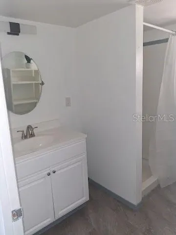 a bathroom with a sink and a toilet