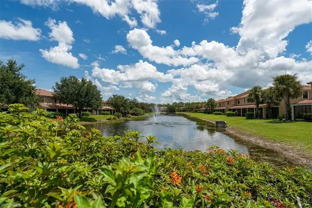 a view of a lake with a city from a lake
