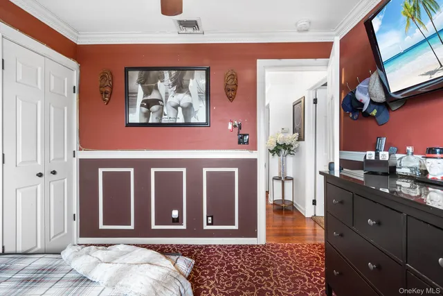 a view of a house with entryway and wooden floor