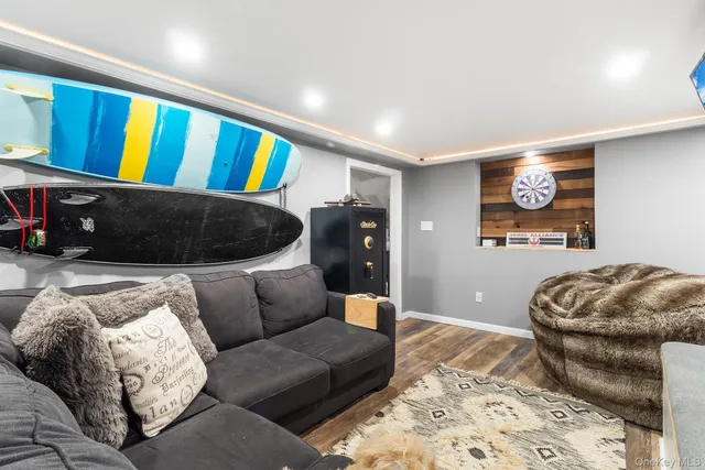 a living room with furniture and a rug