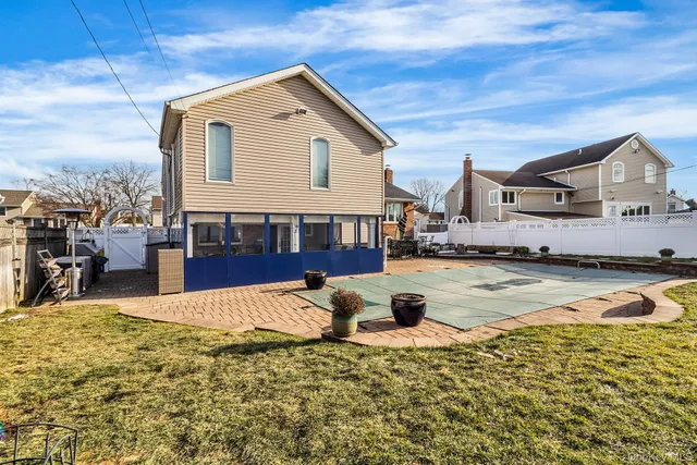 a view of a house with swimming pool