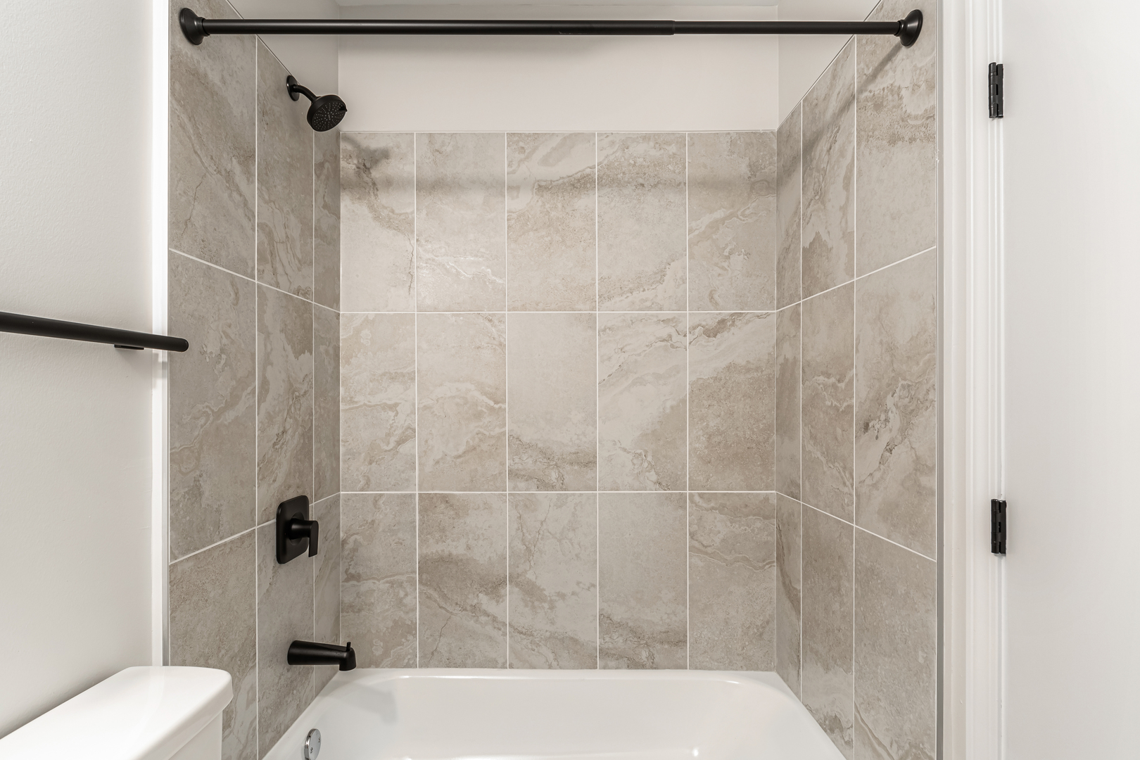 805 North Milwaukee Avenue, Unit 4N Chicago, IL 60642 - Photo 28 of 34 a bathroom with a toilet and shower