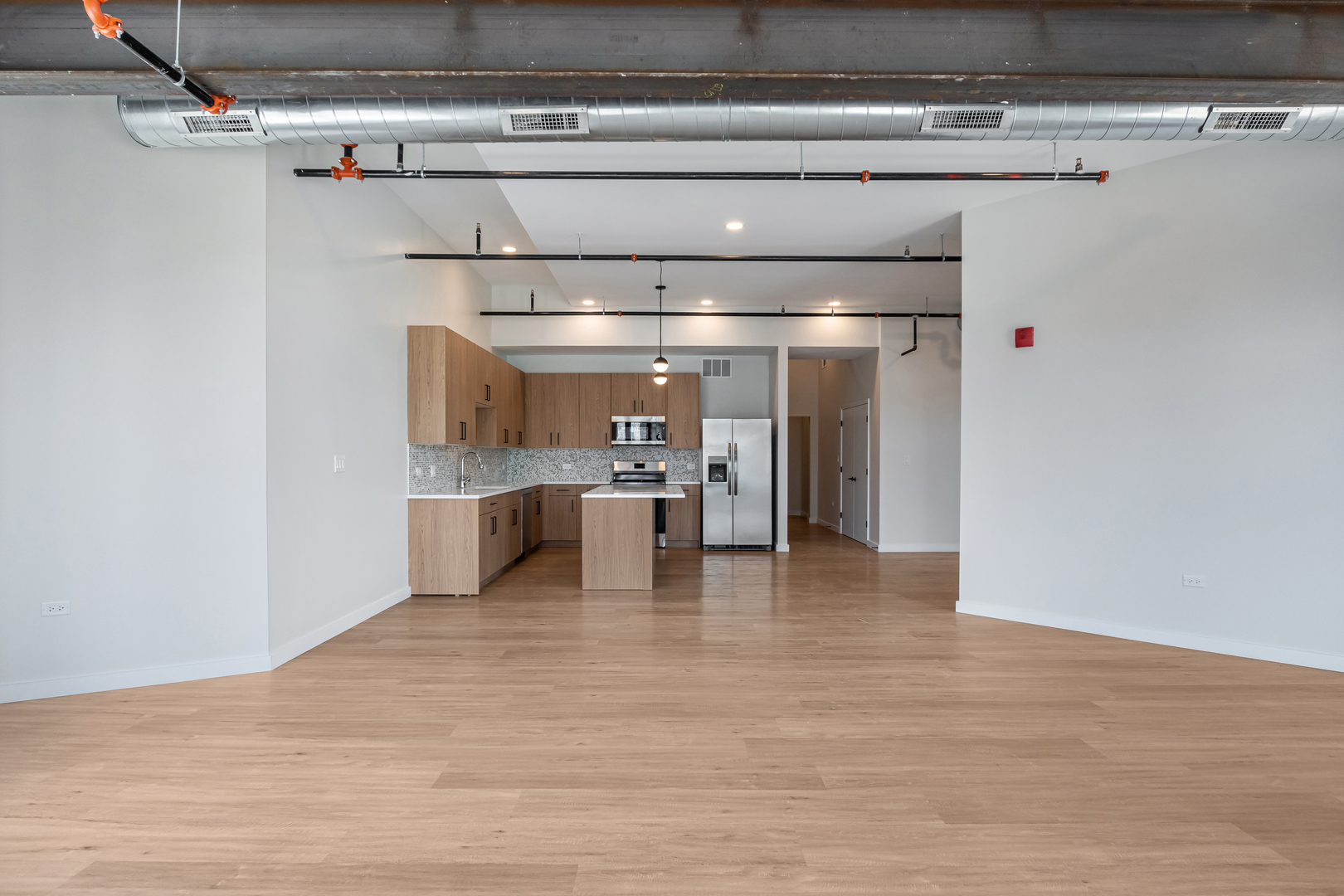 805 North Milwaukee Avenue, Unit 4N Chicago, IL 60642 - Photo 7 of 34 a view of a kitchen with a refrigerator