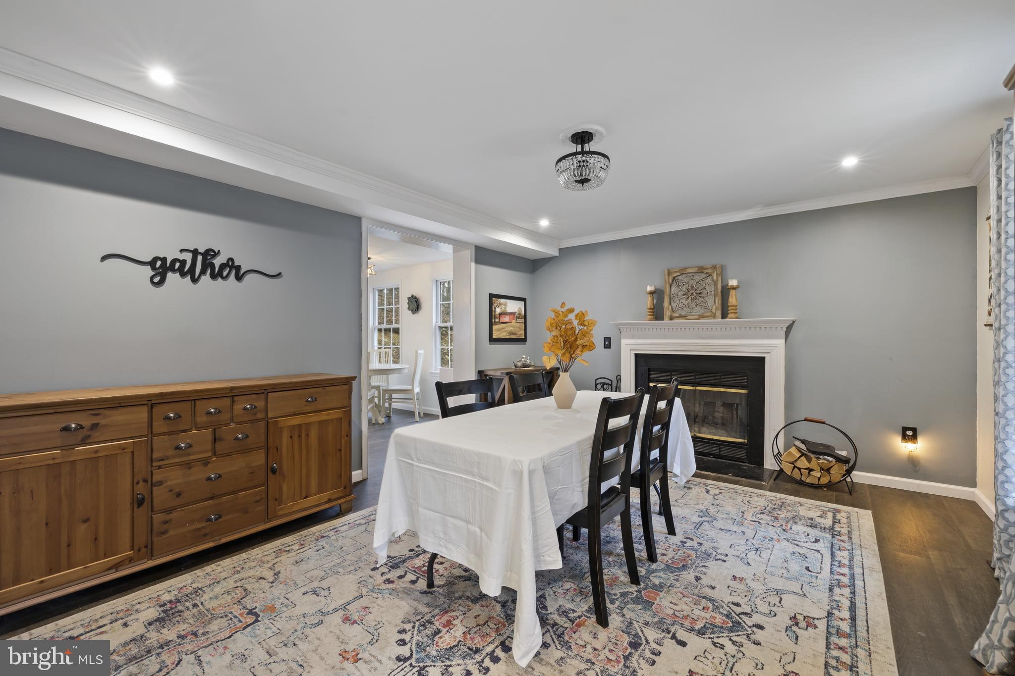 7802 Blue Hill Road Glenville, PA 17329 - Photo 11 of 44 a living room with furniture a dining table and chairs