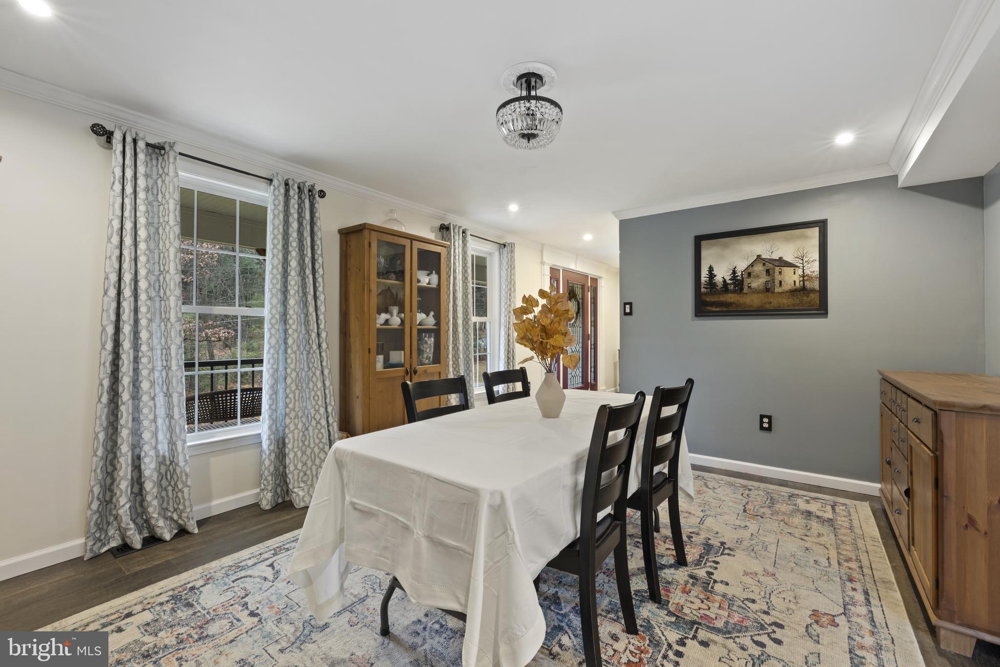 7802 Blue Hill Road Glenville, PA 17329 - Photo 12 of 44 a view of a dining room with furniture and wooden floor
