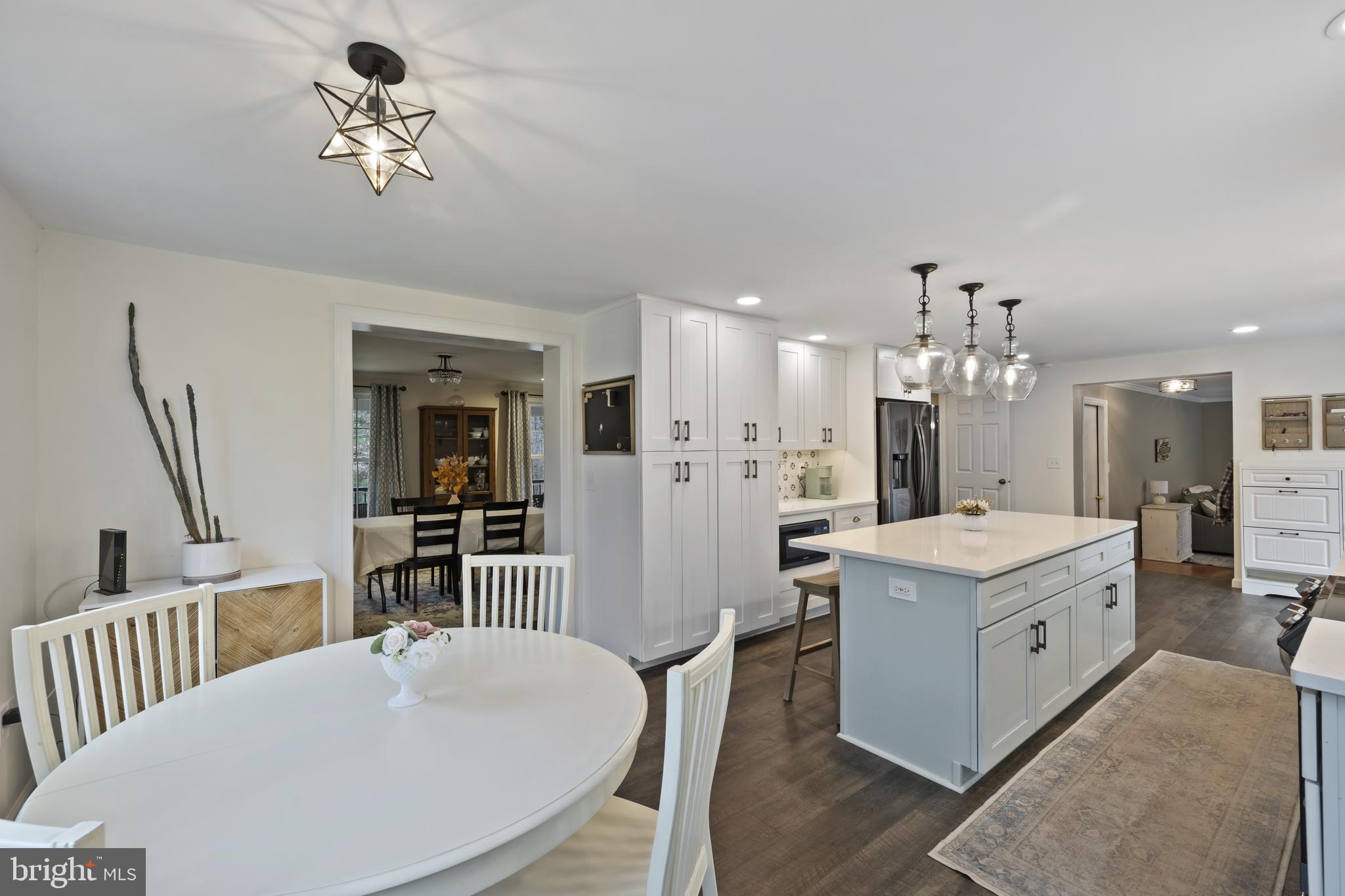 7802 Blue Hill Road Glenville, PA 17329 - Photo 15 of 44 a view of kitchen island kitchen island furniture wooden floor and refrigerator