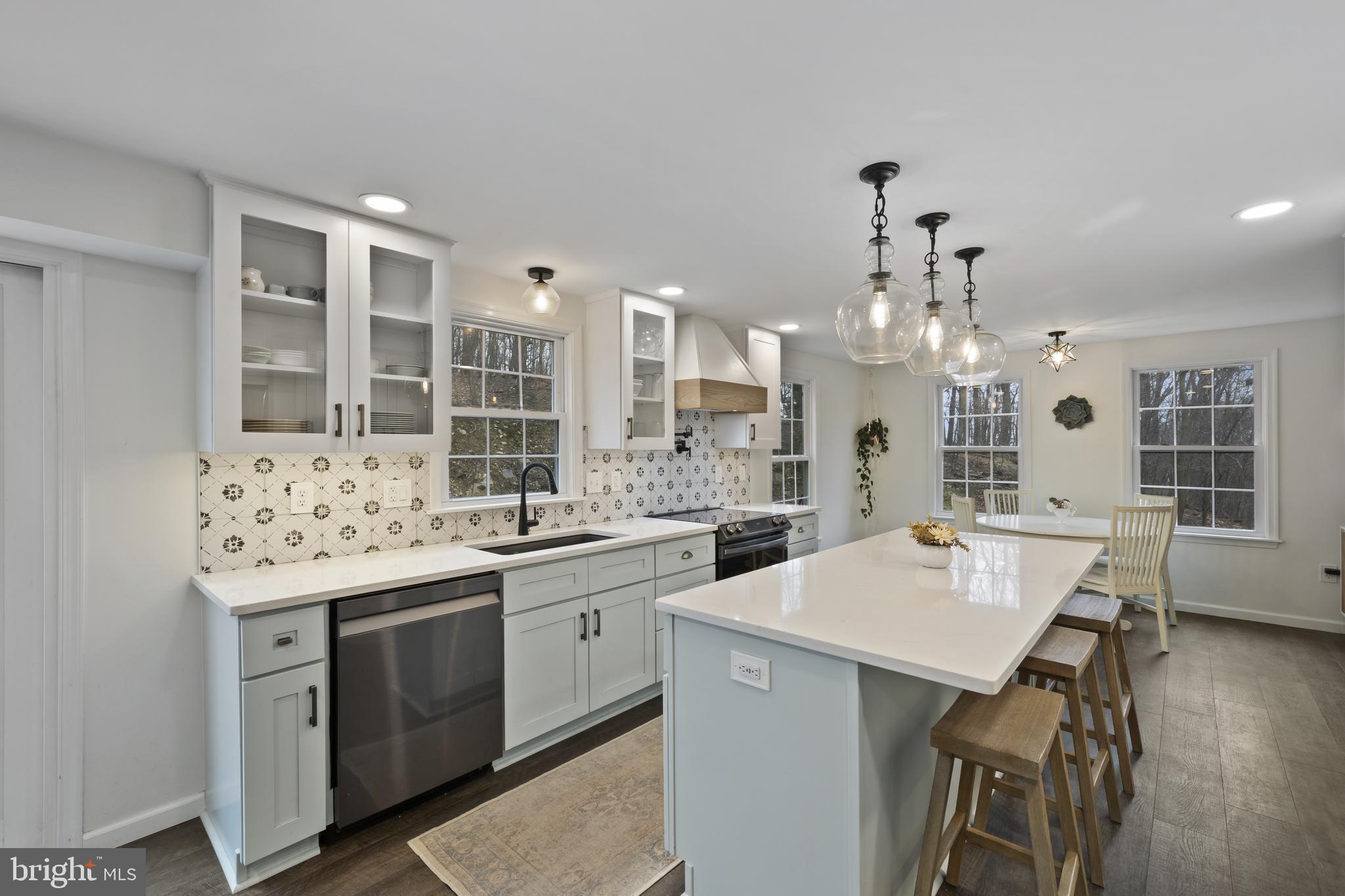 7802 Blue Hill Road Glenville, PA 17329 - Photo 18 of 44 a large kitchen with a counter space a sink and appliances