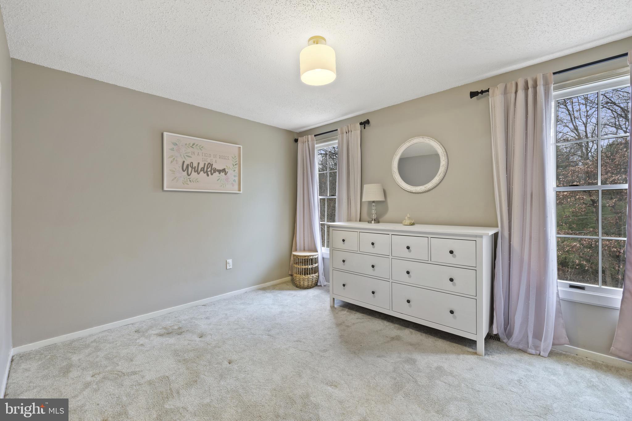 7802 Blue Hill Road Glenville, PA 17329 - Photo 25 of 44 a view of a bedroom with cabinets and window