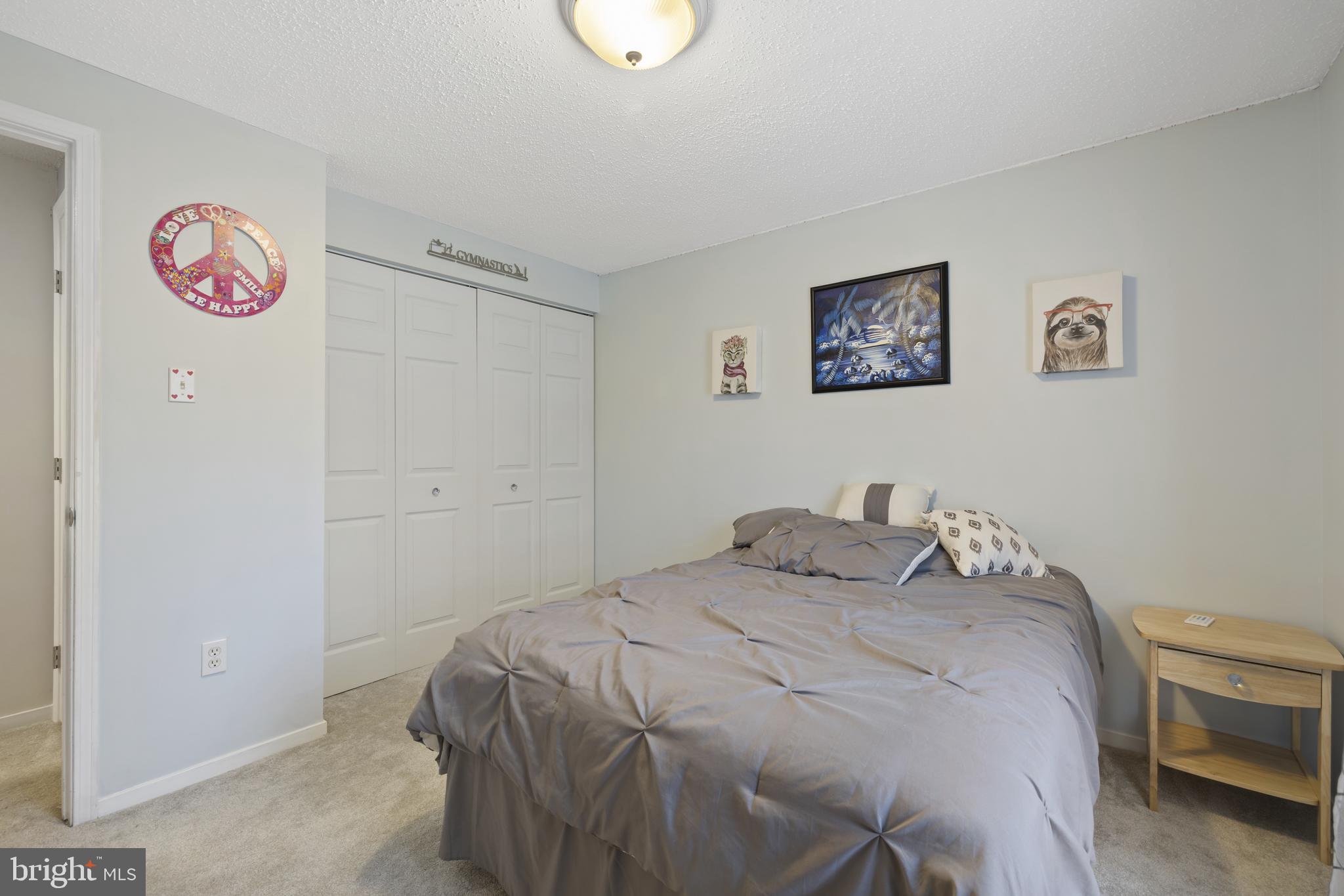 7802 Blue Hill Road Glenville, PA 17329 - Photo 29 of 44 a bedroom with a bed and a painting on the wall