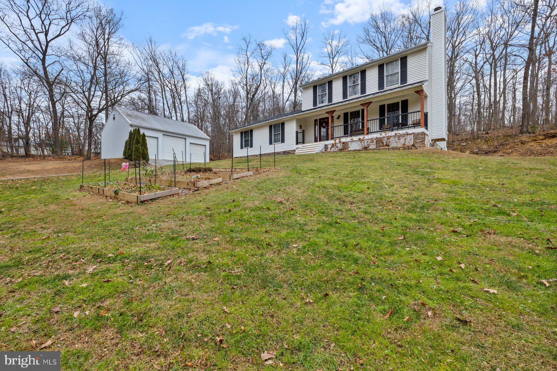 7802 Blue Hill Road Glenville, PA 17329 - Photo 3 of 44 a view of residential houses with yard and trees
