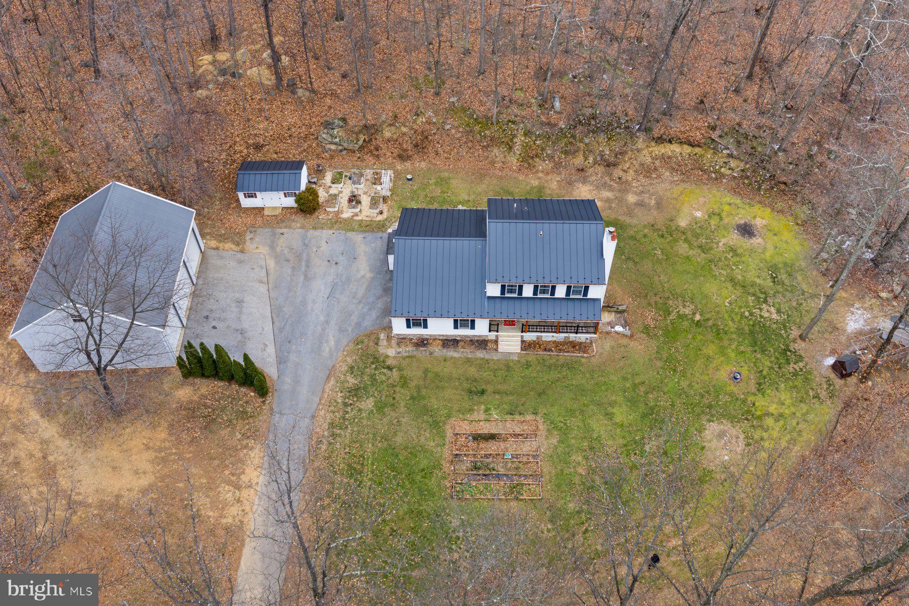7802 Blue Hill Road Glenville, PA 17329 - Photo 42 of 44 an aerial view of a house with outdoor space